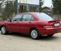 Червоний Міцубісі Lancer, об'ємом двигуна 1.6 л та пробігом 220 тис. км за 4600 $, фото 4 на Automoto.ua