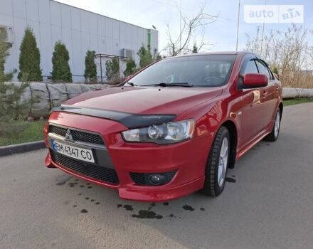 Червоний Міцубісі Lancer, об'ємом двигуна 2 л та пробігом 223 тис. км за 6950 $, фото 19 на Automoto.ua