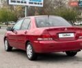 Червоний Міцубісі Lancer, об'ємом двигуна 1.58 л та пробігом 223 тис. км за 6400 $, фото 7 на Automoto.ua