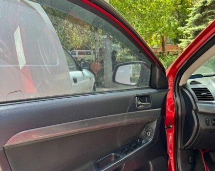 Червоний Міцубісі Lancer, об'ємом двигуна 2 л та пробігом 255 тис. км за 5200 $, фото 6 на Automoto.ua