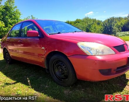 Красный Мицубиси Лансер, объемом двигателя 1.6 л и пробегом 140 тыс. км за 5500 $, фото 2 на Automoto.ua