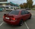 Червоний Міцубісі Lancer, об'ємом двигуна 1.6 л та пробігом 385 тис. км за 4500 $, фото 2 на Automoto.ua