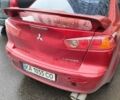 Красный Мицубиси Лансер, объемом двигателя 2 л и пробегом 330 тыс. км за 4500 $, фото 2 на Automoto.ua