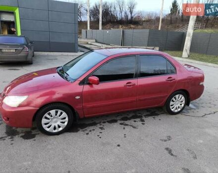 Червоний Міцубісі Lancer, об'ємом двигуна 1.58 л та пробігом 140 тис. км за 6000 $, фото 18 на Automoto.ua