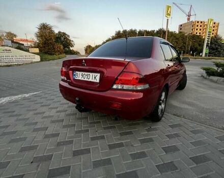 Червоний Міцубісі Lancer, об'ємом двигуна 1.6 л та пробігом 257 тис. км за 4600 $, фото 2 на Automoto.ua