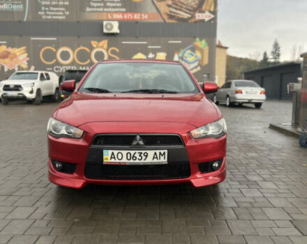 Червоний Міцубісі Lancer, об'ємом двигуна 2 л та пробігом 150 тис. км за 7000 $, фото 1 на Automoto.ua