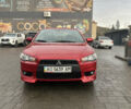Червоний Міцубісі Lancer, об'ємом двигуна 2 л та пробігом 150 тис. км за 7000 $, фото 1 на Automoto.ua