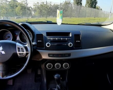 Красный Мицубиси Лансер, объемом двигателя 2 л и пробегом 110 тыс. км за 7500 $, фото 15 на Automoto.ua