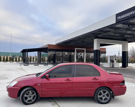 Красный Мицубиси Лансер, объемом двигателя 1.6 л и пробегом 276 тыс. км за 4550 $, фото 3 на Automoto.ua