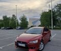 Красный Мицубиси Лансер, объемом двигателя 2 л и пробегом 180 тыс. км за 9300 $, фото 1 на Automoto.ua