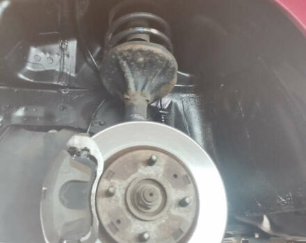 Красный Мицубиси Лансер, объемом двигателя 1.6 л и пробегом 192 тыс. км за 5999 $, фото 14 на Automoto.ua