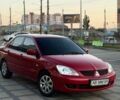 Червоний Міцубісі Lancer, об'ємом двигуна 1.6 л та пробігом 159 тис. км за 4500 $, фото 1 на Automoto.ua
