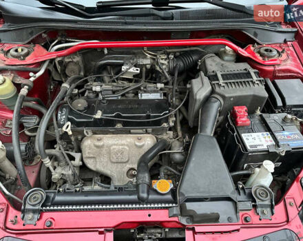 Красный Мицубиси Лансер, объемом двигателя 1.6 л и пробегом 192 тыс. км за 5999 $, фото 8 на Automoto.ua
