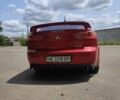 Червоний Міцубісі Lancer, об'ємом двигуна 2 л та пробігом 301 тис. км за 6200 $, фото 1 на Automoto.ua