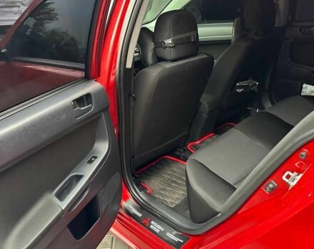 Червоний Міцубісі Lancer, об'ємом двигуна 2 л та пробігом 137 тис. км за 8500 $, фото 8 на Automoto.ua