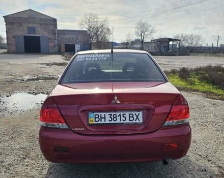Червоний Міцубісі Lancer, об'ємом двигуна 1.6 л та пробігом 220 тис. км за 5800 $, фото 4 на Automoto.ua
