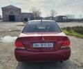 Червоний Міцубісі Lancer, об'ємом двигуна 1.6 л та пробігом 220 тис. км за 5800 $, фото 4 на Automoto.ua