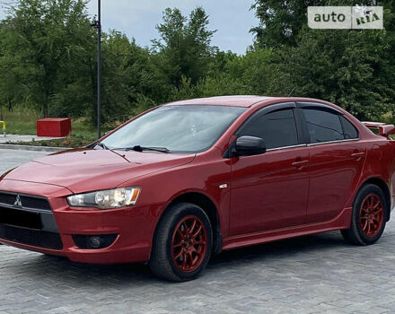 Червоний Міцубісі Lancer, об'ємом двигуна 2 л та пробігом 210 тис. км за 6850 $, фото 4 на Automoto.ua