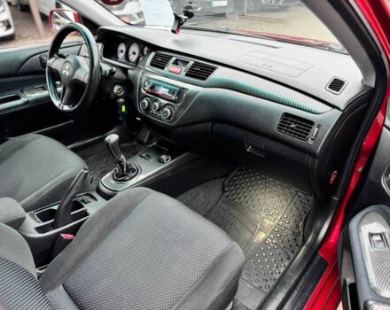 Красный Мицубиси Лансер, объемом двигателя 1.6 л и пробегом 215 тыс. км за 4500 $, фото 15 на Automoto.ua