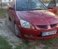 Мицубиси Лансер 2008 в Львове на Automoto.ua Красный Мицубиси Лансер, объемом двигателя 1.58 л и пробегом 280 тыс. км за 3200 $, фото 2 на Automoto.ua
