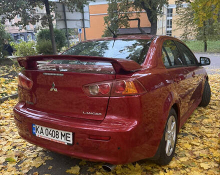 Червоний Міцубісі Lancer, об'ємом двигуна 2 л та пробігом 203 тис. км за 8000 $, фото 13 на Automoto.ua