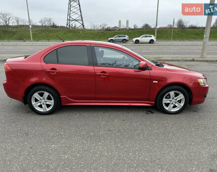 Червоний Міцубісі Lancer, об'ємом двигуна 2 л та пробігом 366 тис. км за 6500 $, фото 13 на Automoto.ua