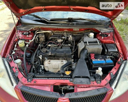 Червоний Міцубісі Lancer, об'ємом двигуна 1.6 л та пробігом 278 тис. км за 3699 $, фото 24 на Automoto.ua
