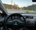 Червоний Міцубісі Lancer, об'ємом двигуна 1.6 л та пробігом 257 тис. км за 4600 $, фото 6 на Automoto.ua