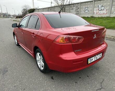 Красный Мицубиси Лансер, объемом двигателя 2 л и пробегом 366 тыс. км за 6500 $, фото 6 на Automoto.ua