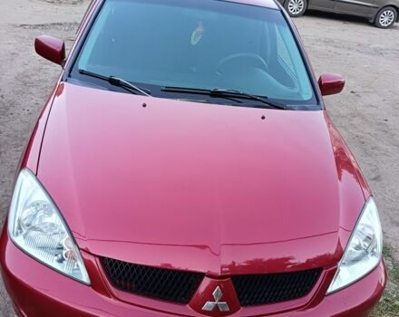 Червоний Міцубісі Lancer, об'ємом двигуна 1.6 л та пробігом 227 тис. км за 5300 $, фото 1 на Automoto.ua