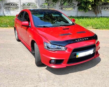 Красный Мицубиси Лансер, объемом двигателя 2 л и пробегом 300 тыс. км за 6200 $, фото 2 на Automoto.ua