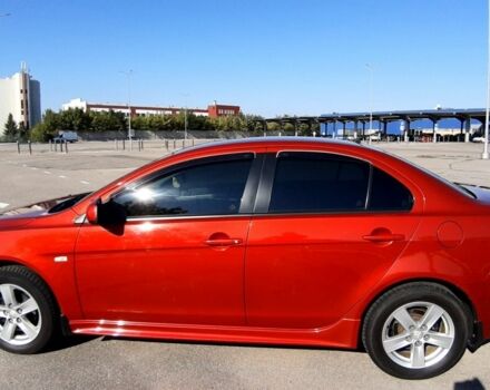 Красный Мицубиси Лансер, объемом двигателя 2 л и пробегом 110 тыс. км за 7500 $, фото 6 на Automoto.ua