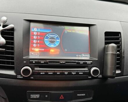 Червоний Міцубісі Lancer, об'ємом двигуна 2 л та пробігом 137 тис. км за 8500 $, фото 13 на Automoto.ua