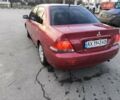 Червоний Міцубісі Lancer, об'ємом двигуна 1.58 л та пробігом 140 тис. км за 6000 $, фото 7 на Automoto.ua