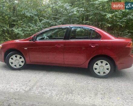 Красный Мицубиси Лансер, объемом двигателя 1.5 л и пробегом 124 тыс. км за 7100 $, фото 9 на Automoto.ua