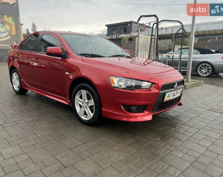 Червоний Міцубісі Lancer, об'ємом двигуна 2 л та пробігом 150 тис. км за 7000 $, фото 2 на Automoto.ua