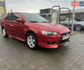 Червоний Міцубісі Lancer, об'ємом двигуна 2 л та пробігом 150 тис. км за 7000 $, фото 2 на Automoto.ua