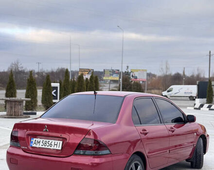 Красный Мицубиси Лансер, объемом двигателя 1.6 л и пробегом 276 тыс. км за 4550 $, фото 5 на Automoto.ua