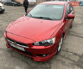 Красный Мицубиси Лансер, объемом двигателя 2 л и пробегом 330 тыс. км за 5250 $, фото 12 на Automoto.ua