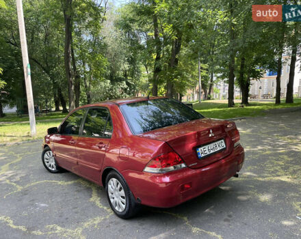 Червоний Міцубісі Lancer, об'ємом двигуна 1.6 л та пробігом 270 тис. км за 5699 $, фото 10 на Automoto.ua