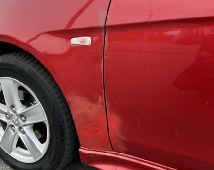 Червоний Міцубісі Lancer, об'ємом двигуна 2 л та пробігом 366 тис. км за 6500 $, фото 25 на Automoto.ua