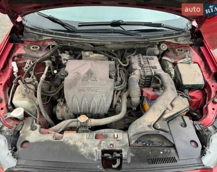 Червоний Міцубісі Lancer, об'ємом двигуна 1.5 л та пробігом 190 тис. км за 6700 $, фото 4 на Automoto.ua