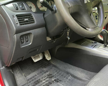 Червоний Міцубісі Lancer, об'ємом двигуна 1.6 л та пробігом 270 тис. км за 5699 $, фото 48 на Automoto.ua