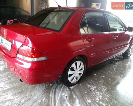Червоний Міцубісі Lancer, об'ємом двигуна 1.6 л та пробігом 242 тис. км за 5100 $, фото 6 на Automoto.ua