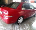 Червоний Міцубісі Lancer, об'ємом двигуна 1.6 л та пробігом 242 тис. км за 5100 $, фото 6 на Automoto.ua