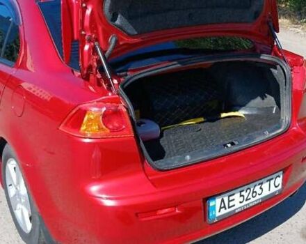 Мицубиси Лансер 2008 в Днепре (Днепропетровске) на Automoto.ua Красный Мицубиси Лансер, объемом двигателя 2 л и пробегом 140 тыс. км за 6200 $, фото 6 на Automoto.ua