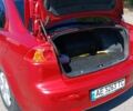 Мицубиси Лансер 2008 в Днепре (Днепропетровске) на Automoto.ua Красный Мицубиси Лансер, объемом двигателя 2 л и пробегом 140 тыс. км за 6200 $, фото 6 на Automoto.ua