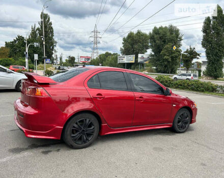 Червоний Міцубісі Lancer, об'ємом двигуна 2 л та пробігом 208 тис. км за 7500 $, фото 9 на Automoto.ua