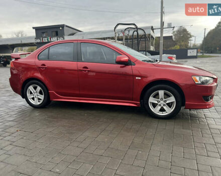 Червоний Міцубісі Lancer, об'ємом двигуна 2 л та пробігом 150 тис. км за 7000 $, фото 3 на Automoto.ua