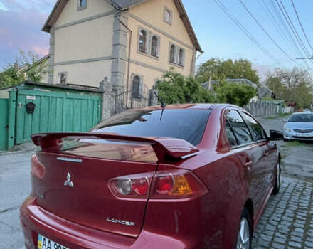 Міцубісі Lancer 2008 у Києві на Automoto.ua Червоний Міцубісі Lancer, об'ємом двигуна 2 л та пробігом 250 тис. км за 7000 $, фото 3 на Automoto.ua